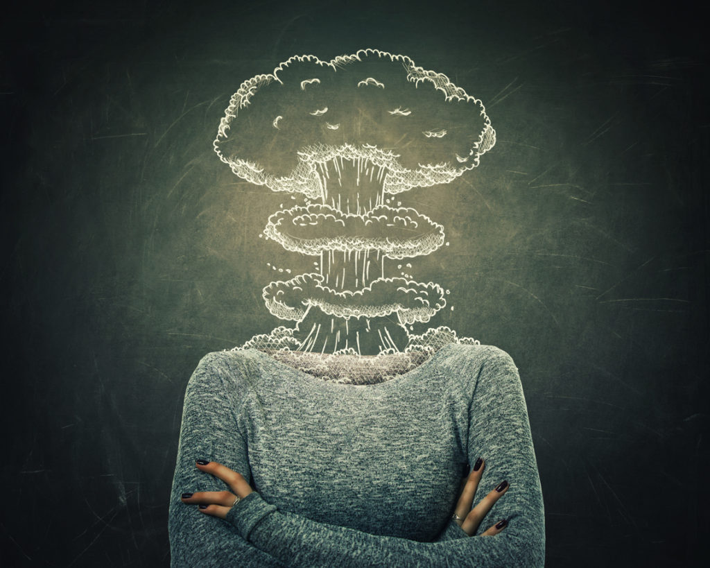 Woman with image of explosion over her head