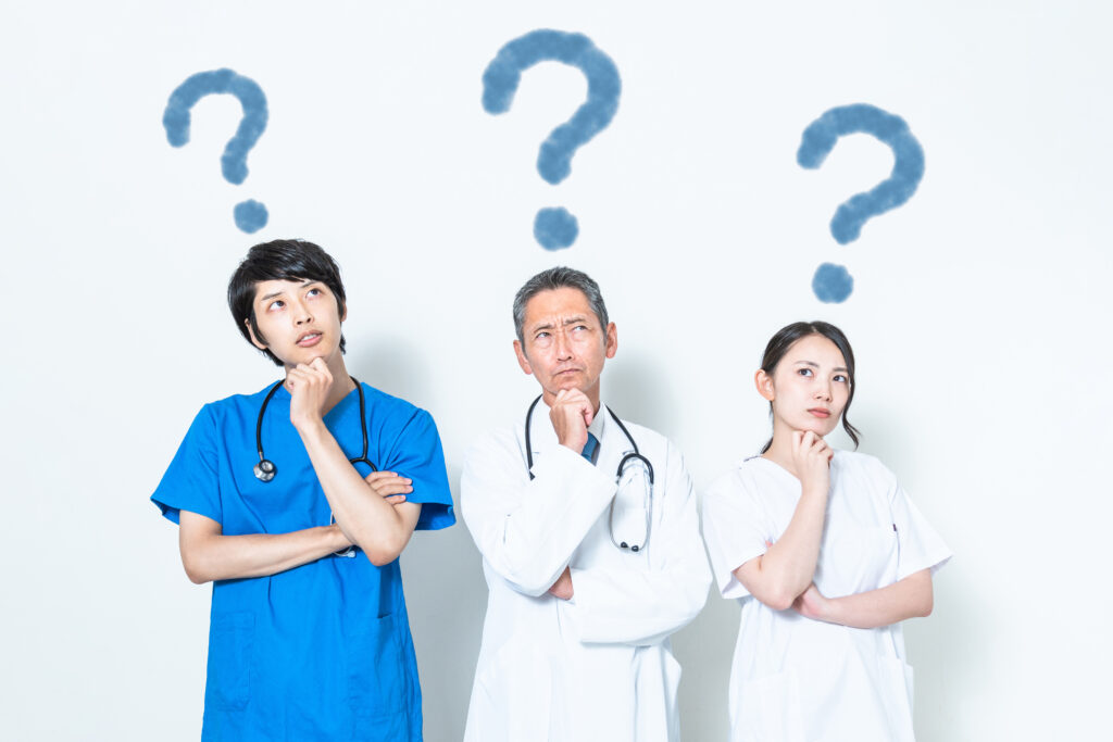 Doctors with question marks over their heads